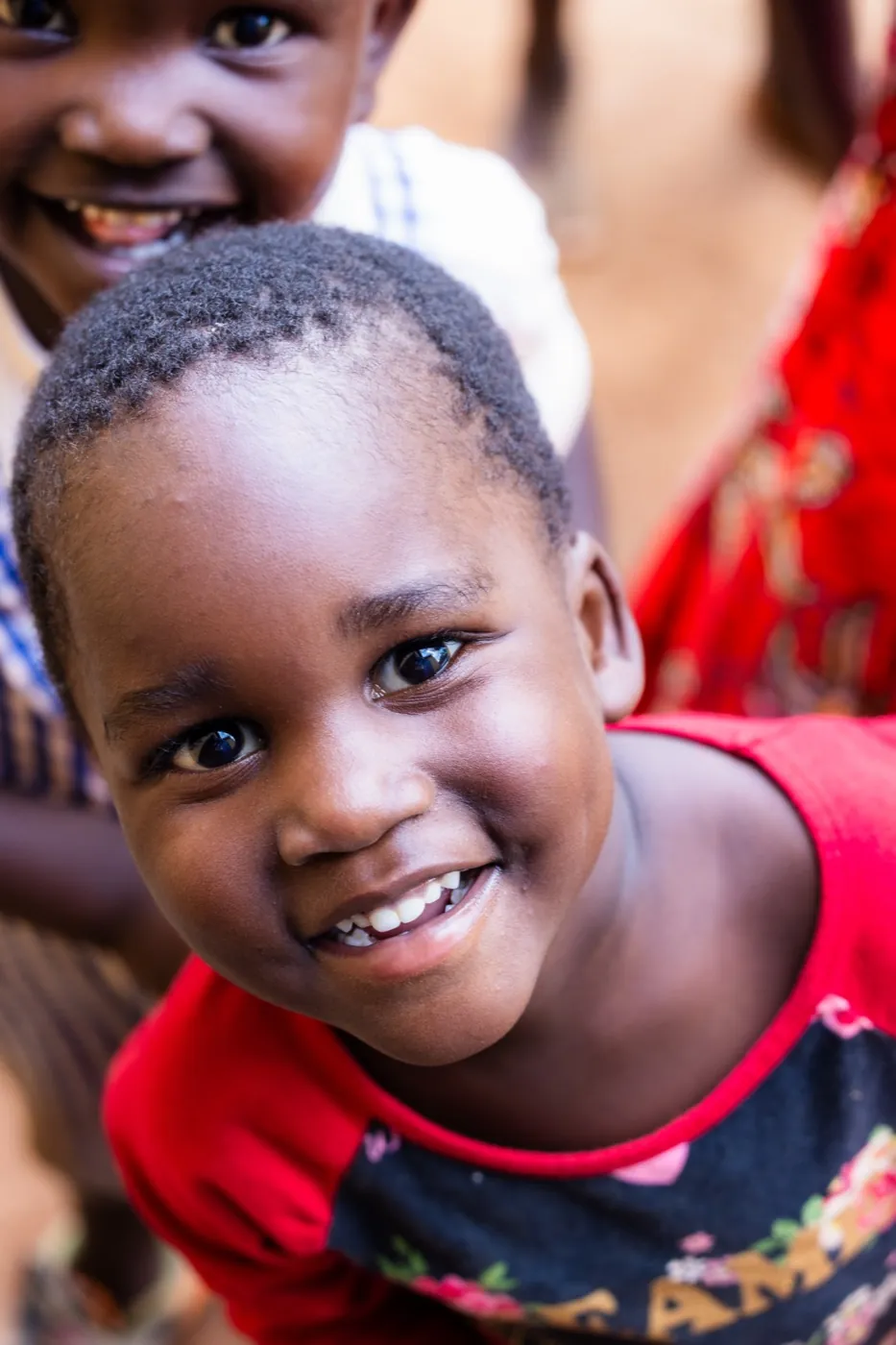 Child smiling, Africa mission trip 2026
